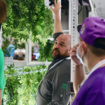 Cultivation Experts Showing Off Grow Racks at MJBizCon